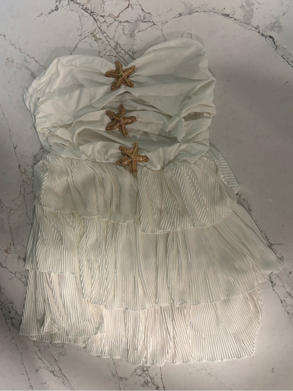 White Strapless Ruffled Dress with Gold Starfish Accents